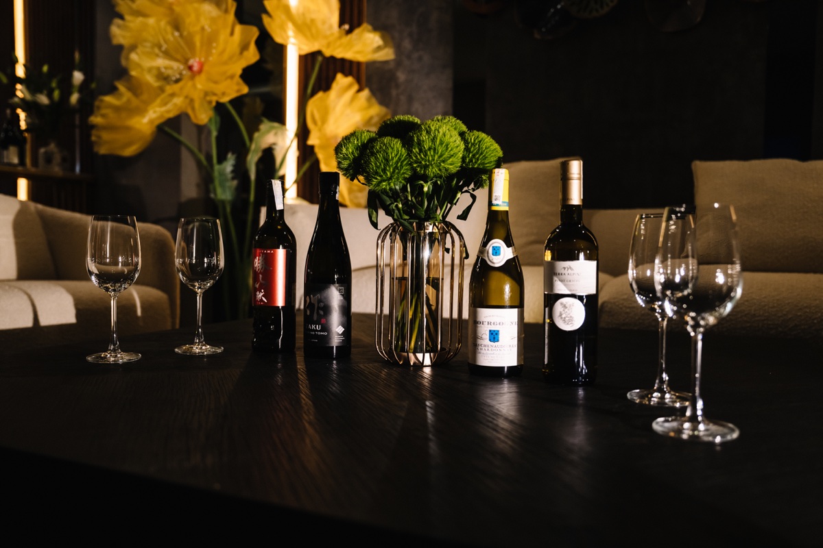 Wine and glassware arranged for a celebration at Kasen
